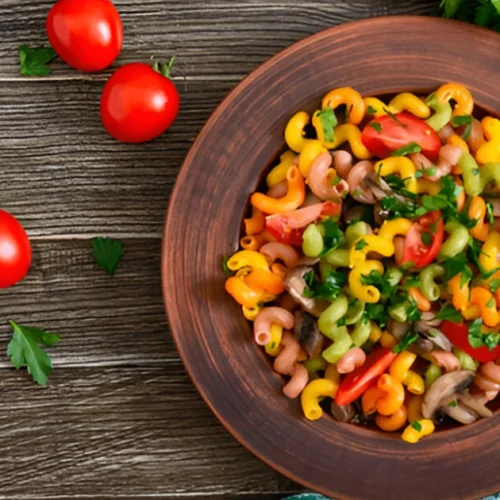 Cavatappi pasta twisting in a creamy sauce, showcasing its unique corkscrew shape